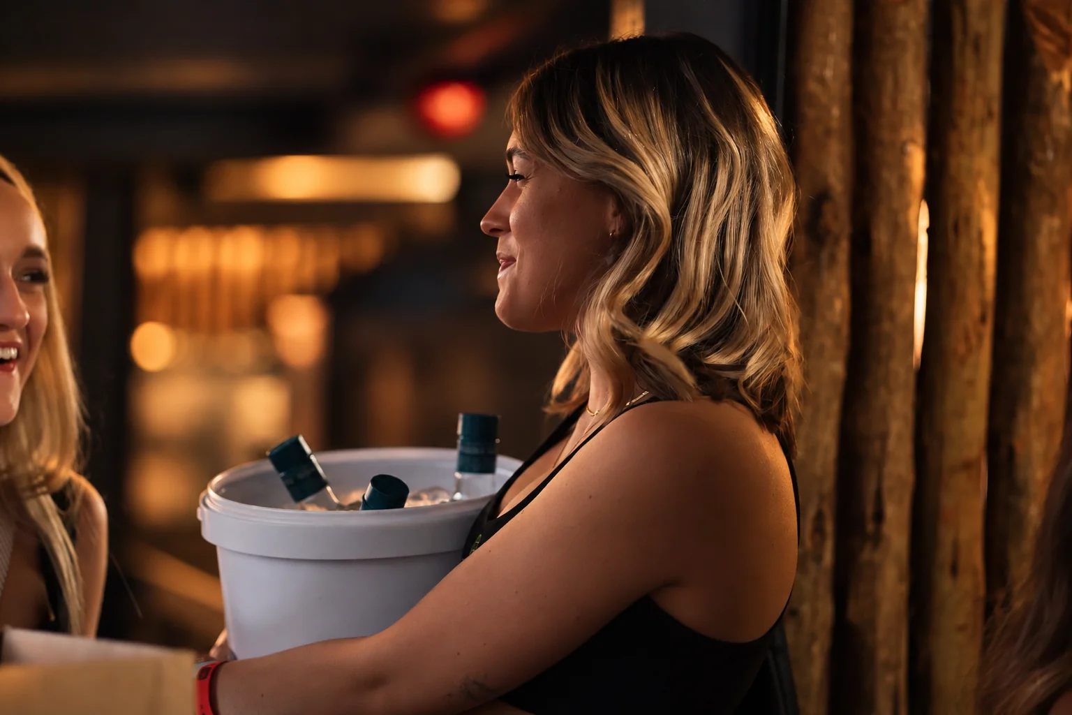 Braize event staff serving drinks at an evening event