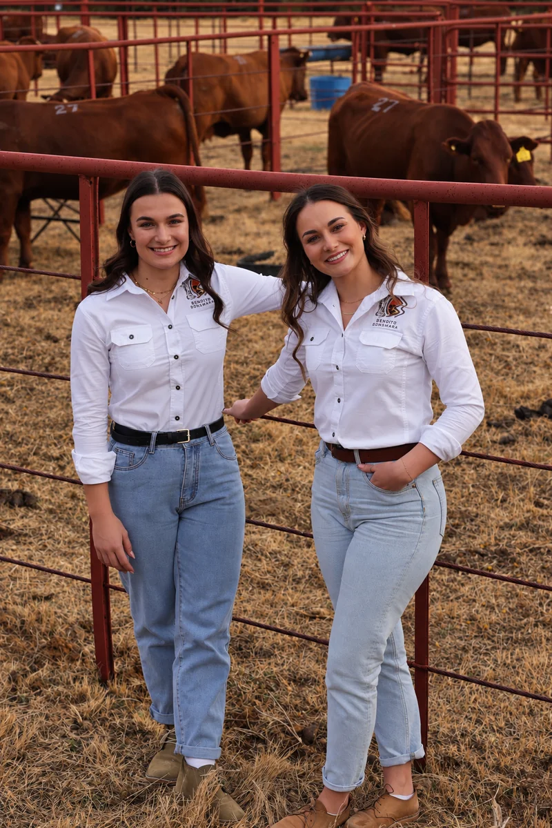 Two promotional staff at a livestock event